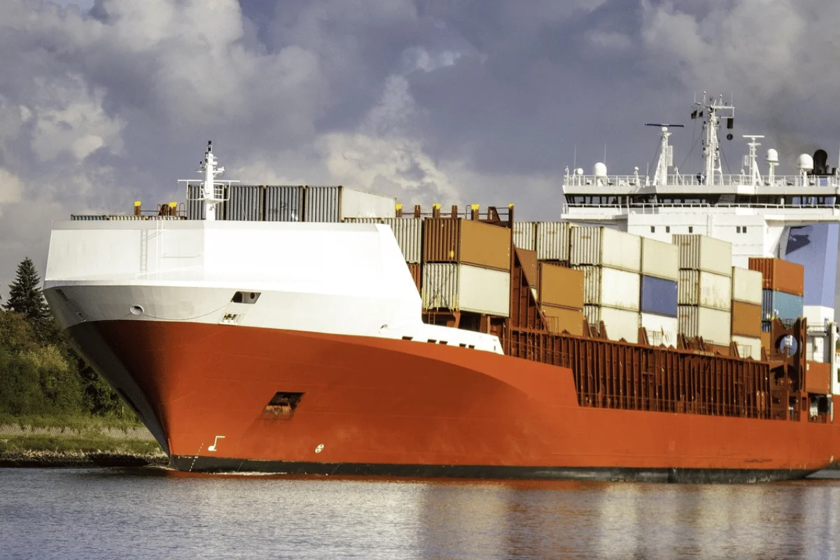 Large container ship carrying cargo across the ocean.