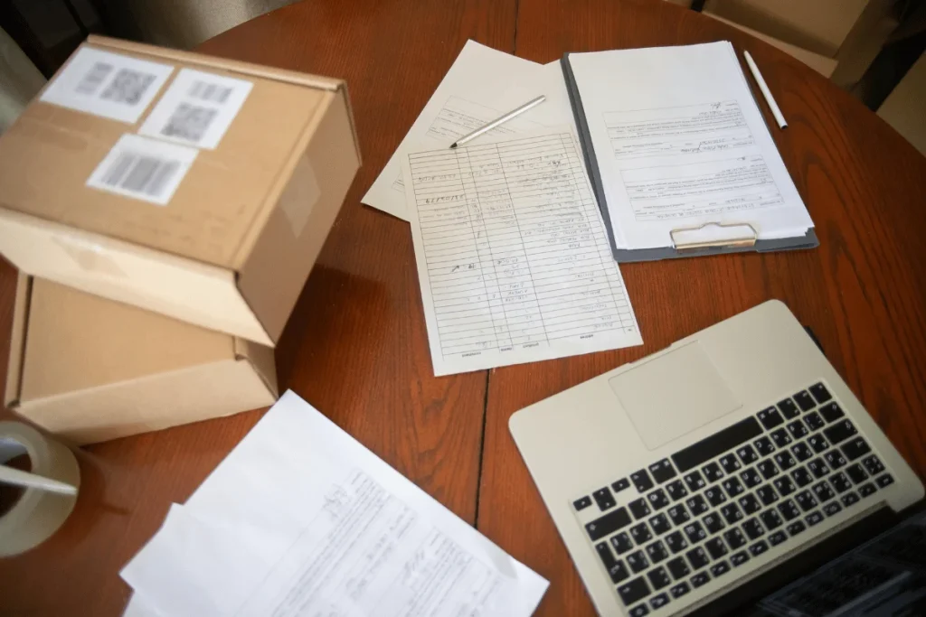 Shipping Documents for Export: A Complete Guide 4 A clipboard holding detailed paperwork highlights structured processes and the administrative aspect of shipping.