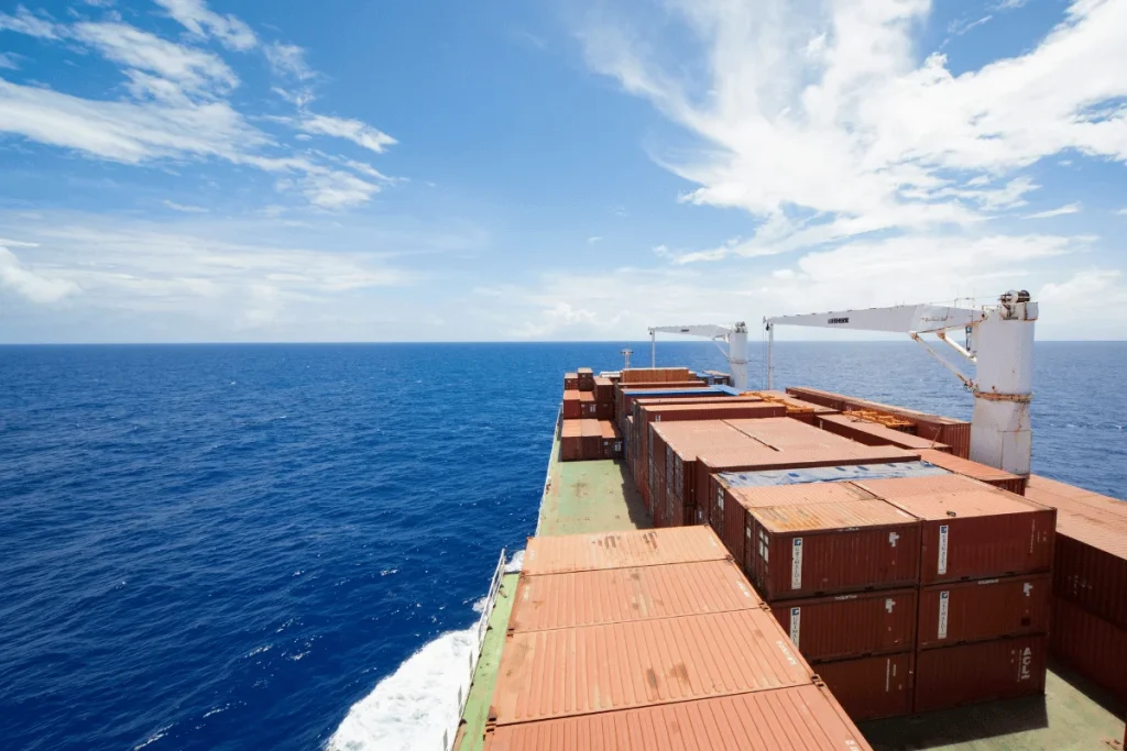 What to Do When a Shipment Is Stuck at Customs 3 Large cargo ship transporting containers across the ocean.