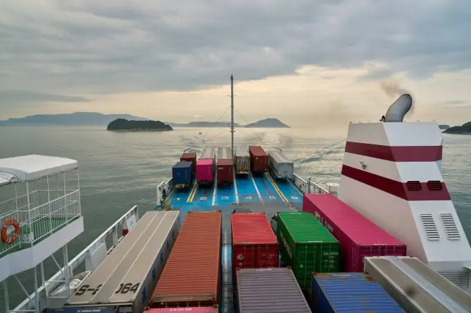 Shipping 12 A cargo ship's stern on the open sea, seen from the bridge.